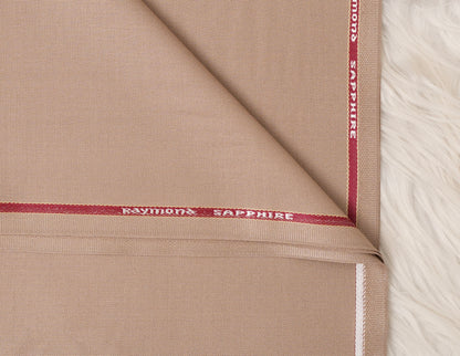 Close-up of beige fabric with 'Raymond Sapphire' branding.